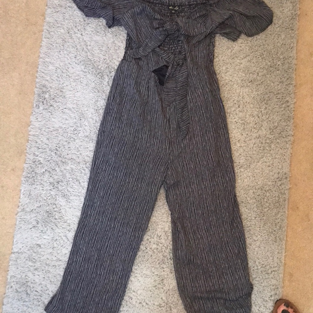 Navy striped front knot romper. New with tags.